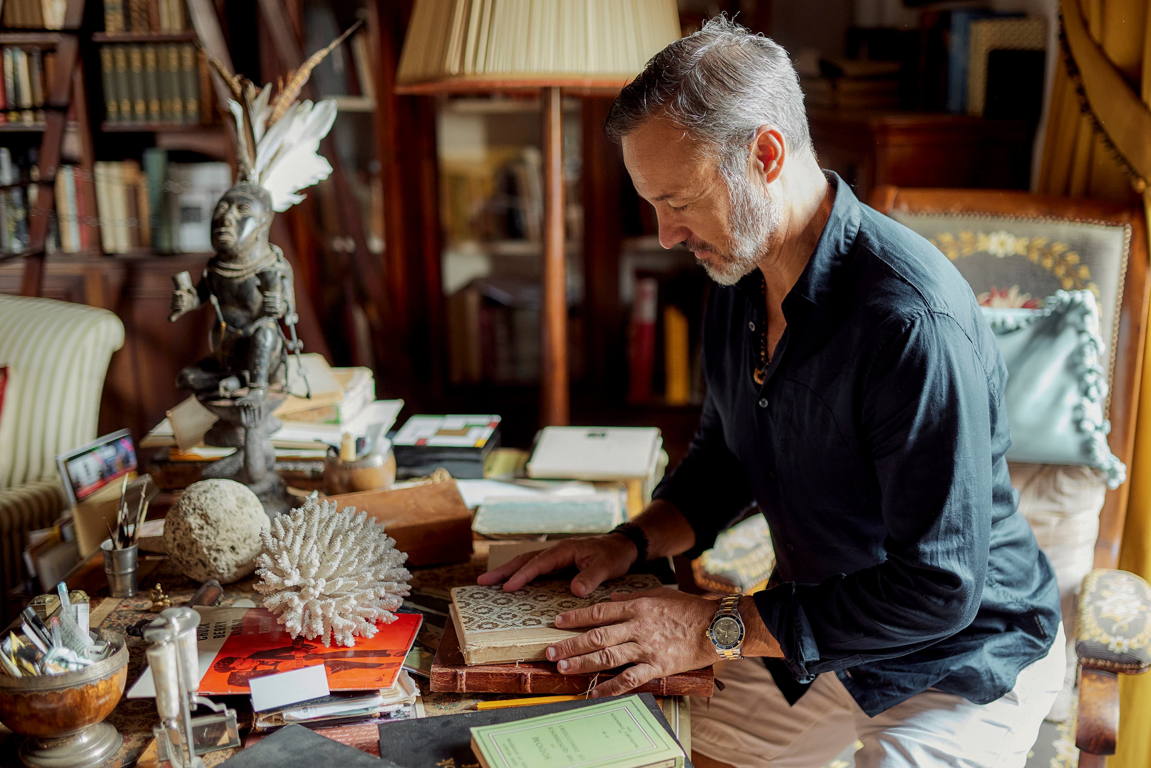 Eric Edmeades at his desk in an Italian library